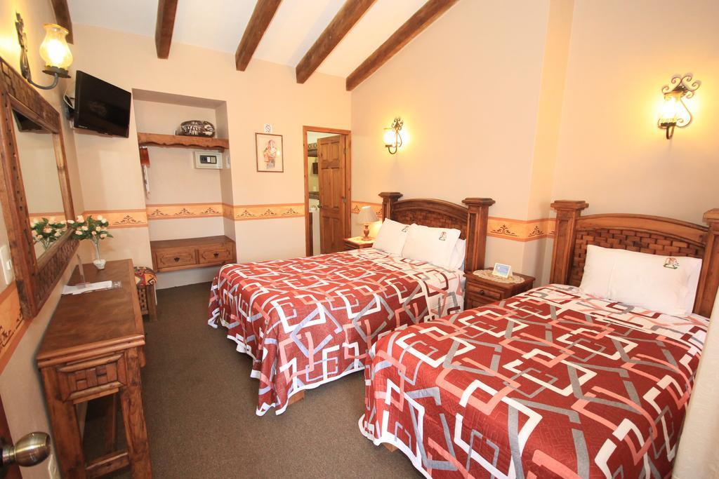 Hotel La Casa De Mama Сан-Кристобаль-де-Ла-Касас Номер фото